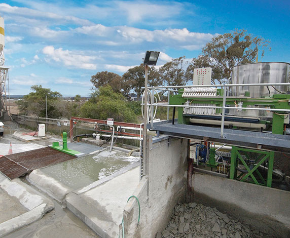The concrete recycling system enables the unused concrete to be separated into its original aggregate and grey water. The separated aggregates can be reused for future mixes and even the gray water can be recycled or separated.